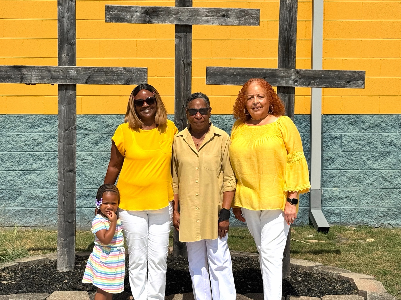 CEC Women's Ushers standing together outside the church